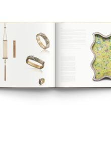 Book cover of Yewn: Contemporary Art Jewels and the Silk Road, featuring a reclaimed wood bangle, with yellow Sapphire set in 18K yellow gold. Published by ACC Art Books.