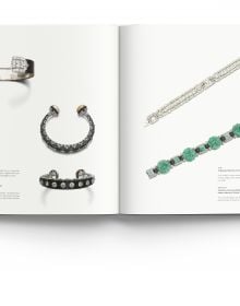 Luxury diamond and ruby jewelled bangles, on white cover of 'Understanding Jewellery, The 20th Century', by ACC Art Books.