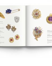 Luxury diamond and ruby jewelled bangles, on white cover of 'Understanding Jewellery, The 20th Century', by ACC Art Books.