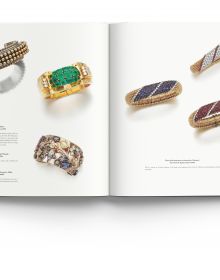 Luxury diamond and ruby jewelled bangles, on white cover of 'Understanding Jewellery, The 20th Century', by ACC Art Books.