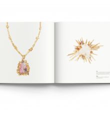 18ct gold citrine and diamond collar pendant necklace, on white cover of 'Modern British Jewellery Designers 1960-1980', by ACC Art Books.