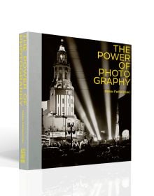 Book cover of The Power of Photography, featuring a premiere at Carthay Circle, Los Angeles in 1949, with floodlights illuminating the night sky. Published by ACC Art Books.