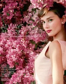 Audrey Hepburn in pink dress leaning on wall of pink bougainvillea flowers, on front cover of 'Always Audrey' by ACC Art Books.