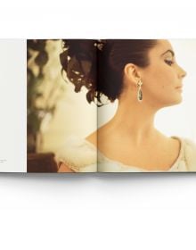 Book cover of Forever Elizabeth, Iconic Photographers on a Legendary Star, featuring a captivating close up of a blue-eyed Elizabeth Taylor. Published by ACC Art Books.