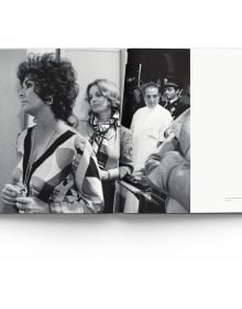 Book cover of Forever Elizabeth, Iconic Photographers on a Legendary Star, featuring a captivating close up of a blue-eyed Elizabeth Taylor. Published by ACC Art Books.