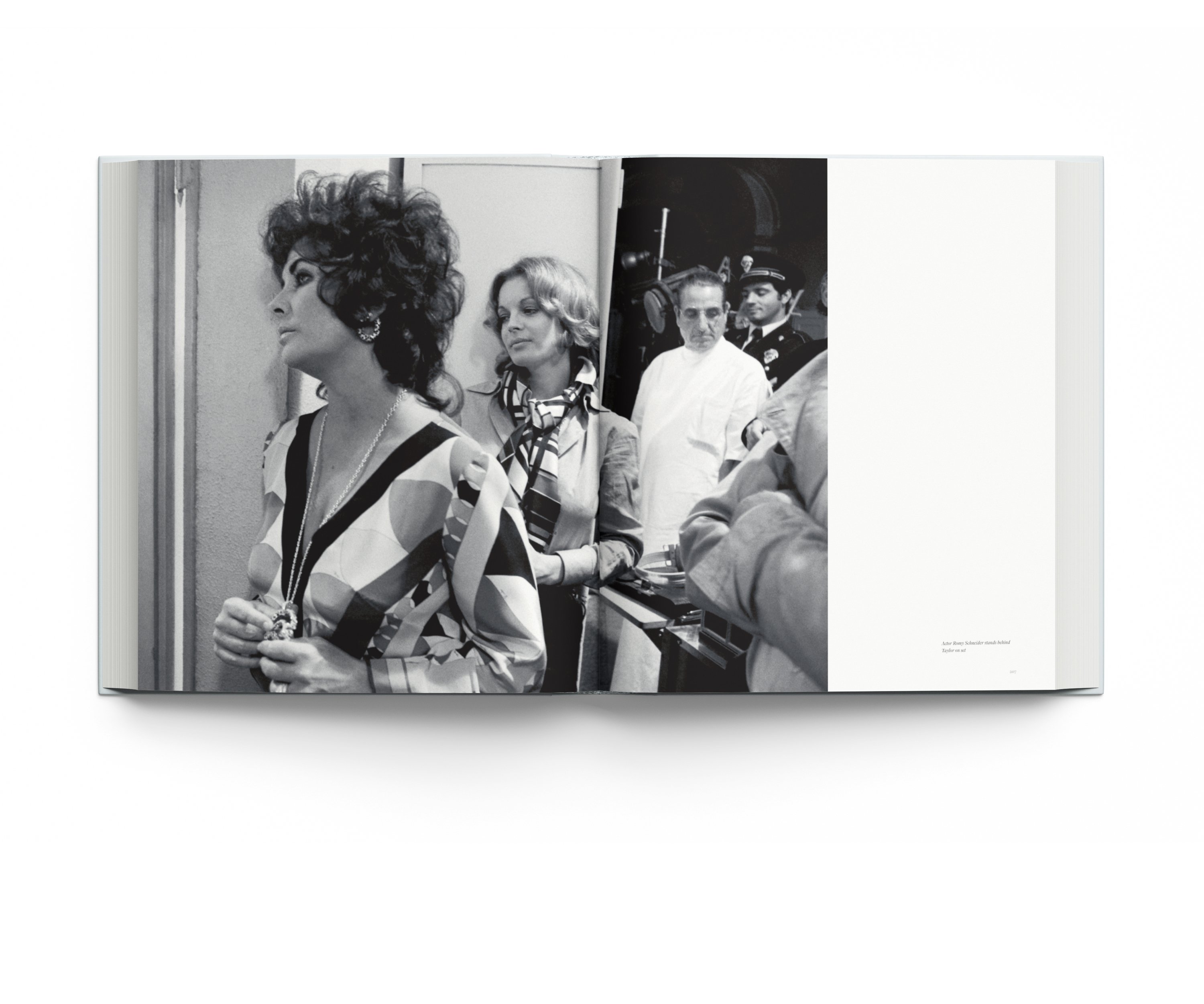 Book cover of Forever Elizabeth, Iconic Photographers on a Legendary Star, featuring a captivating close up of a blue-eyed Elizabeth Taylor. Published by ACC Art Books.