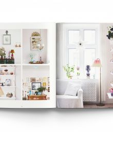 Nordic style white interior with green Christmas tree, on cover of 'THE CHRISTMAS SEASON CREATED BY SCANDINAVIAN ARTISTS', by ACC Art Books.