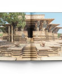 Carved interior of Deccan temple, shrine through entrance, on cover of 'Temples of Deccan India', by ACC Art Books.