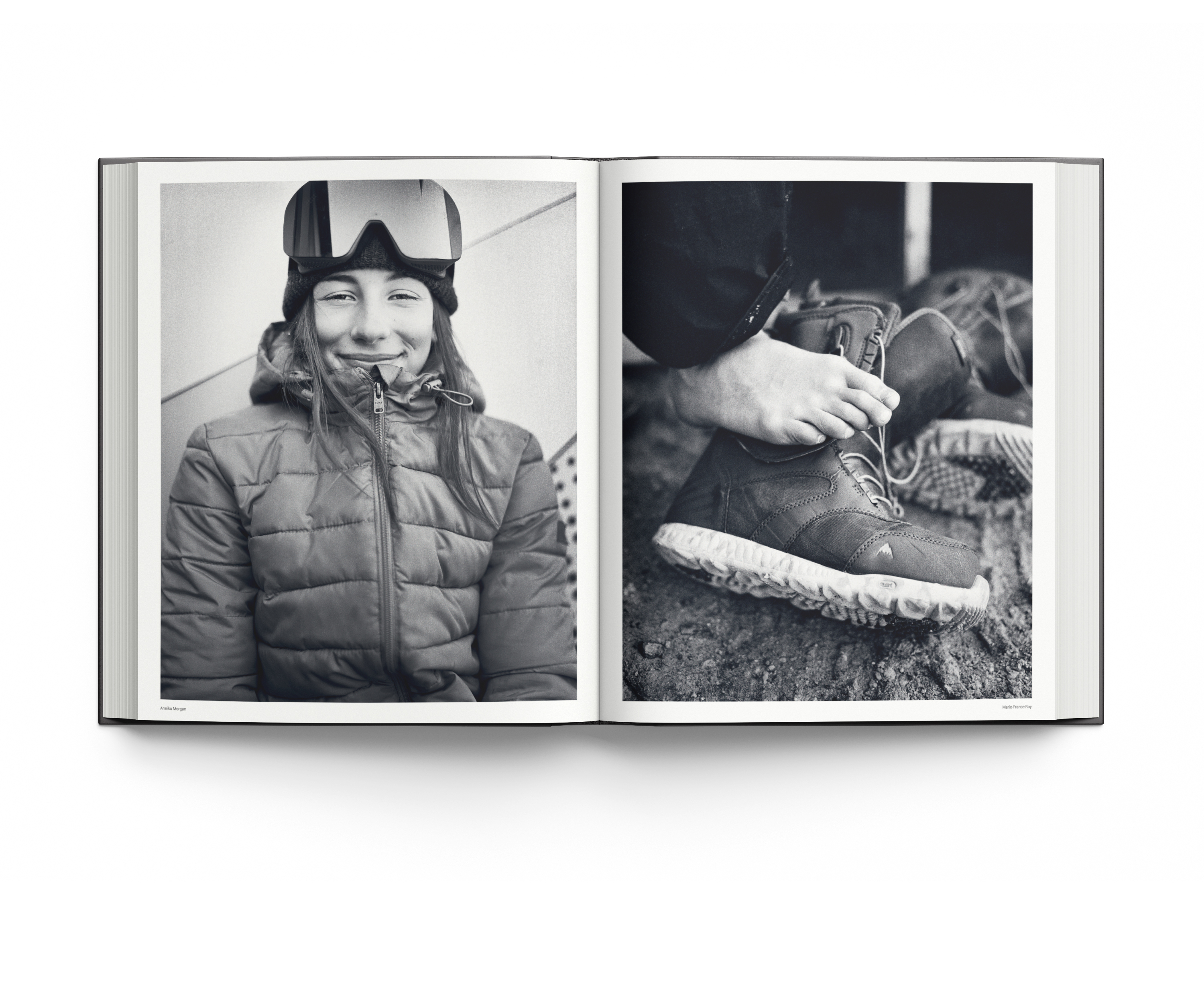 American professional snowboarder Hana Beaman snowboarding down rail, on black cover of 'HEROES WOMEN IN SNOWBOARDING' by ACC Art Books.