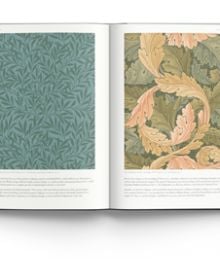 Book cover of Mary Schoeser's The Art of Wallpaper: Morris & Co. in Context, with Morris Pimpernel Bayleaf/Manilla wallpaper design. Published by ACC Art Books.