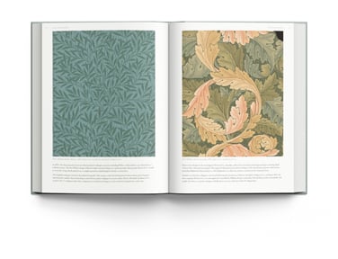Book cover of Mary Schoeser's The Art of Wallpaper: Morris & Co. in Context, with Morris Pimpernel Bayleaf/Manilla wallpaper design. Published by ACC Art Books.