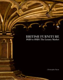 Underneath of gothic style carved table with single centre leg, on black cover of 'British Furniture 1820 to 1920', by ACC Art Books.