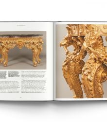 Underneath of gothic style carved table with single centre leg, on black cover of 'British Furniture 1820 to 1920', by ACC Art Books.