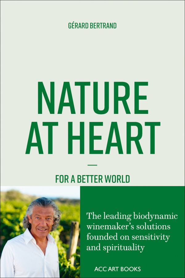 Book cover of Nature at Heart, with Gérard Bertrand in open white shirt. by ACC Art Books.