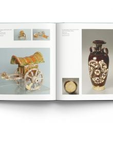 Book cover of Yaozhou Wares From Museums and Art Institutes Around the World, with a pale green ewer with carved design and double phoenix spout. Published by ACC Art Books.