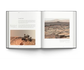 Book cover of Out of This World: Historic Milestones in NASA’s Human Space Flight, featuring the illuminated Space Shuttle Endeavour STS-134 on launch pad, in 2011, under black sky with bright full moon. Published by ACC Art Books.