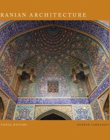The magnificent interior blue tiled ceiling of Jameh Mosque of Isfahan, Iran, on orange cover of 'Iranian Architecture, A Visual History', by ACC Art Books.