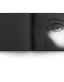 Book cover of Eye-D: Portraits by Anna Gabriel, with the close up of eye, eyebrow and bridge of nose. Published by ACC Art Books.