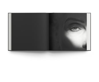 Book cover of Eye-D: Portraits by Anna Gabriel, with the close up of eye, eyebrow and bridge of nose. Published by ACC Art Books.