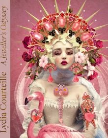 Porcelain skinned female model adorned with bold pink jewelled earrings and brooches, on cover of 'Lydia Courteille, A Jeweller’s Odyssey', by ACC Art Books.