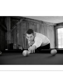 Slip cased book cover of Paul Newman: Blue-Eyed Cool, Deluxe, Milton H. Greene, featuring a publicity shot of Paul Newman playing pool. Published by ACC Art Books.