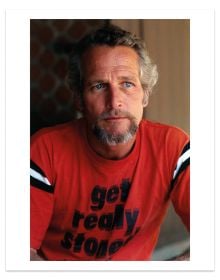 Slip cased book cover of Paul Newman: Blue-Eyed Cool, Deluxe, Eva Sereny, featuring a publicity shot of Paul Newman in red t-shirt Published by ACC Art Books.