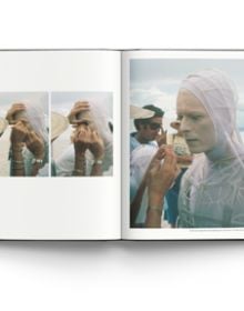 Book cover of David Bowie: Rock ’n’ Roll with Me, featuring David Bowie posing in white t-shirt with arms above head. Published by ACC Art Books.