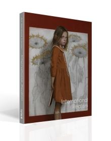 Book cover of International Realism, with an oil painting titled 'An Unsatisfying Ending, 2021', by Mark Pugh, featuring a girl holding a book behind her back, with sunflowers behind. Published by ACC Art Books.