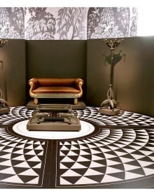 Book cover of The Art Deco Style, Great Designers & Collectors, with Schumacher art deco fountain wallpaper in gold and silver. Published by ACC Art Books.