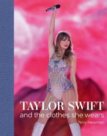Taylor Swift on stage in silver sequin bodysuit and boots, bright pink background, on cover of 'And the Clothes She Wears', by ACC Art Books.