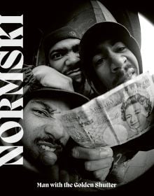 American hip hop trio, The Alkaholics, one member holding a ten-pound note, on cover of 'Normski, Man with the Golden Shutter', by ACC Art Books.