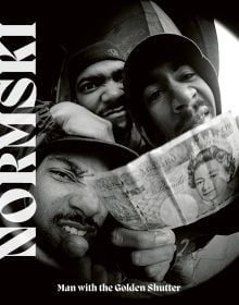 Book cover of Normski, Man with the Golden Shutter, featuring American hip hop trio, The Alkaholics, with one member flashing a ten-pound note. Published by ACC Art Books.