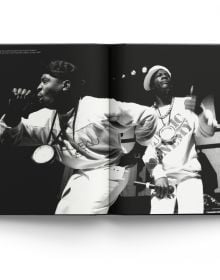 Book cover of Normski, Man with the Golden Shutter, featuring American hip hop trio, The Alkaholics, with one member flashing a ten-pound note. Published by ACC Art Books.