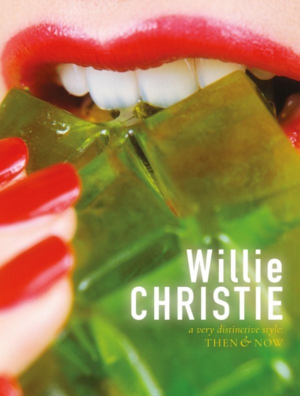 Book cover of Willie Christie, with a close-up of mouth of Vogue model Marcie Hunt wearing red lipstick, and biting on lime green jelly cubes. Published by ACC Art Books.