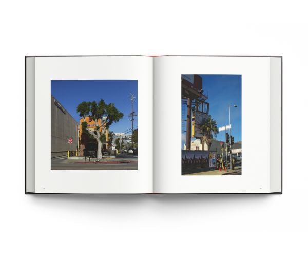 Book cover of Seeing As, René Balcer, with a row of knives and a machete on magnetic strip, with American flag and globe to left. Published by ACC Art Books.