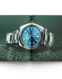 Book cover of Rolex Philosophy, with a silver Rolex GMT-Master II Mens Watch. Published by ACC Art Books.