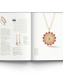 Highly decorative pieces of gold jewellery with coloured jewels, on black cover of 'Jewelry's Shining Stars: The Next Generation, 45 Visionary Women Designers', by ACC Art Books.