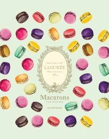 Colouful macarons on mint green cover of 'Ladurée Macarons, The Recipes', by ACC Art Books.