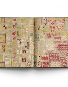 Book cover of Stephen Ellcock’s Book of Textiles: The Karun Thakar Collection, with bold fabric. Published by ACC Art Books.