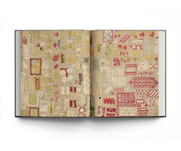 Book cover of Stephen Ellcock’s Book of Textiles: The Karun Thakar Collection, with bold fabric. Published by ACC Art Books.