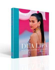 Book cover of Scarlett Conlon's Dua Lipa: And the Clothes She Wears, with the disco star posing in a floral Bottega Veneta dress at the Barbie premiere. Published by ACC Art Books.