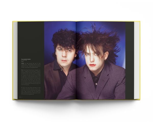 Book cover of The Cure: Stills, with a close up of front man Robert Smith in red lipstick. Published by ACC Art Books.