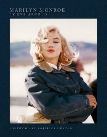 Book cover of Marilyn Monroe: By Eve Arnold, with the actress wearing denim jacket as she strikes a pose on the set of 'The Misfits', 1960. Published by ACC Art Books.