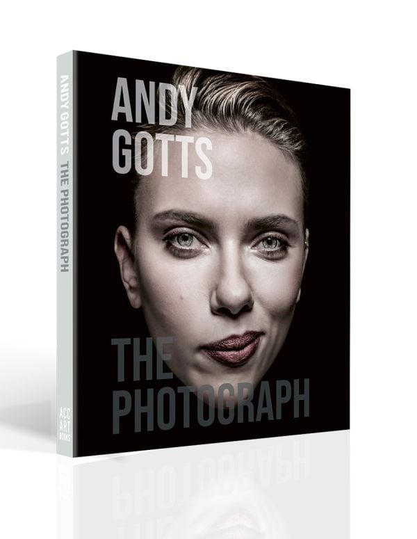 Book cover of Andy Gotts The Photograph, featuring actress Scarlett Johansson smirking. Published by ACC Art Books.