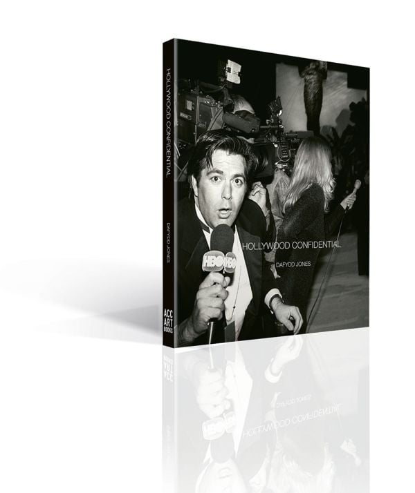 Book cover of Hollywood: Confidential, with a HBO news reporter talking to the camera. Published by ACC Art Books.