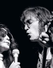 Book cover of Dream Lovers: John and Yoko in NYC: The Photographs of Brian Hamill; with a couple staring at viewer. Published by ACC Art Books.