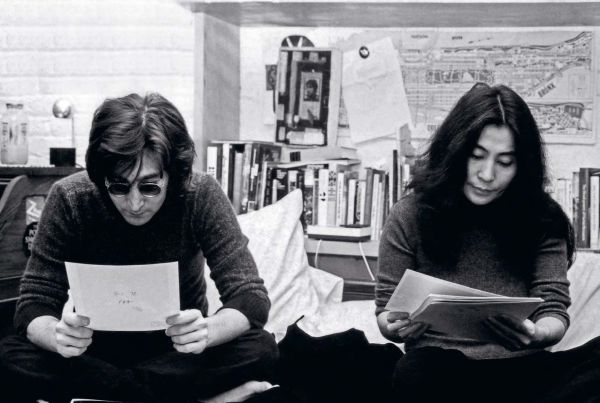 Book cover of Dream Lovers: John and Yoko in NYC: The Photographs of Brian Hamill; with a couple staring at viewer. Published by ACC Art Books.