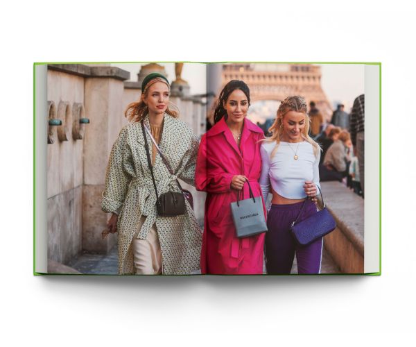 Book cover of Paris. In Fashion; featuring a model holding a green handbag. Published by ACC Art Books.
