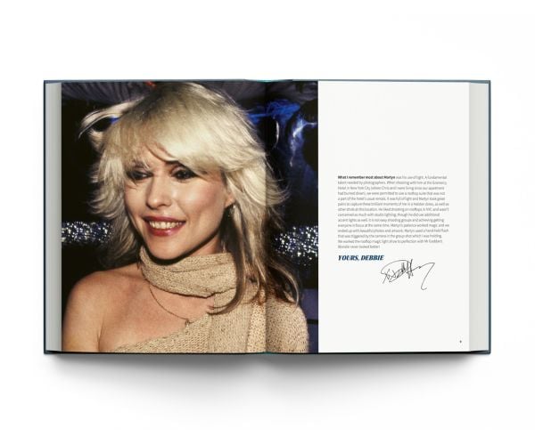 Book cover of Blondie in Camera 1978, featuring a promo shot of the band on the roof of New York recording studio The Record Plant, where One Way Or Another was recorded. Published by ACC Art Books.