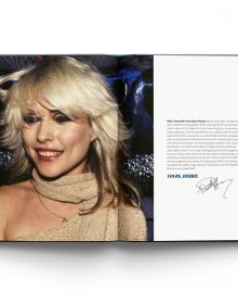 Book cover of Blondie in Camera 1978, featuring a promo shot of the band on the roof of New York recording studio The Record Plant, where One Way Or Another was recorded. Published by ACC Art Books.